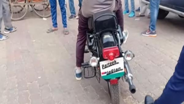 पुलिस ने भागते हुए बाइकर को पकड़ा, किया 32,500 रुपये का चालान