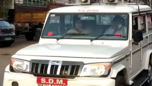 मध्य प्रदेश कोरोना लॉकडाउन एसडीएम पत्नी कार चलाते आई नजर जानकारी