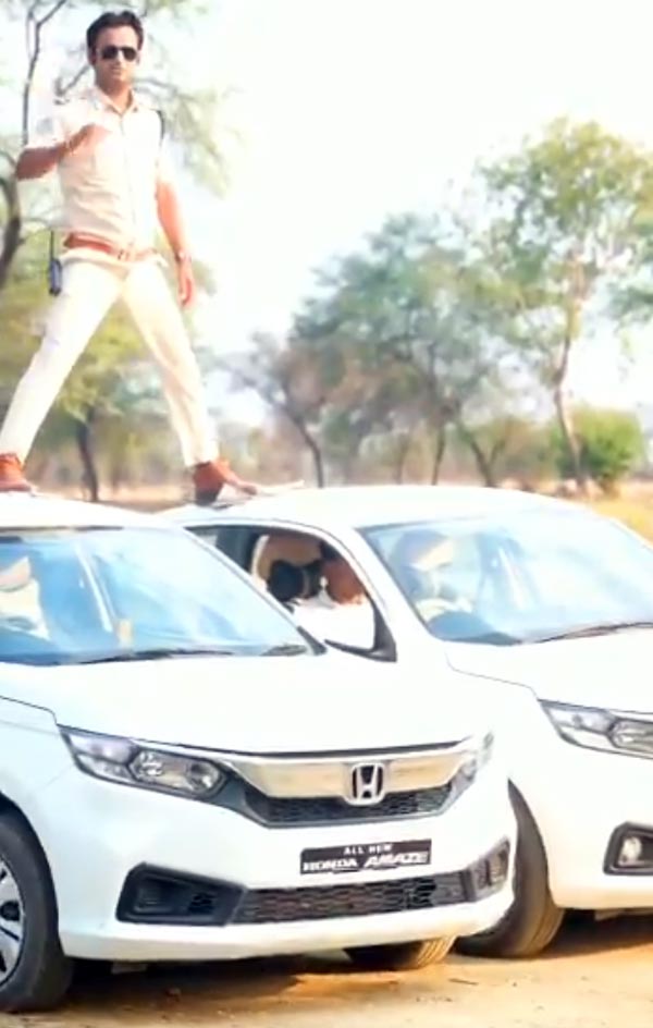 Cop Recreates Singham Movie Stunt In MP: पुलिस वाला कार पर चढ़ कर बन रहा था सिंघम, लगा सिर्फ 5000 रुपये का फाइन