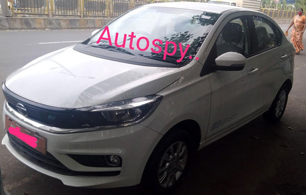 Tata Tigor EV Facelift Spied: टाटा टिगोर ईवी फेसलिफ्ट टेस्टिंग के दौरान आई नजर, तस्वीरें