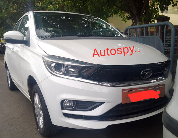 Tata Tigor EV Facelift Spied: टाटा टिगोर ईवी फेसलिफ्ट टेस्टिंग के दौरान आई नजर, तस्वीरें
