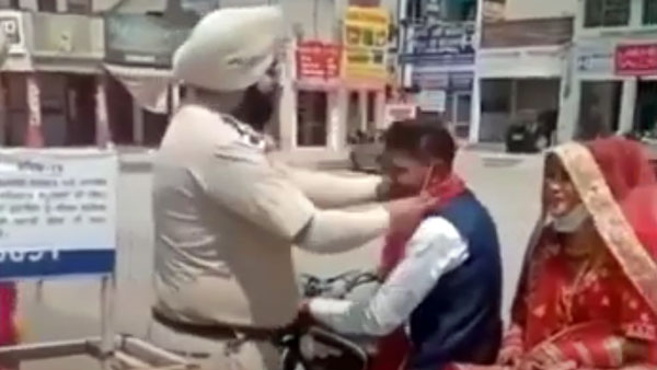 लॉकडाउन में Bike से जाते नवविवाहित जोड़े का पुलिस ने कुछ ऐसे किया स्वागत, IPS अधिकारी ने शेयर किया वीडियो