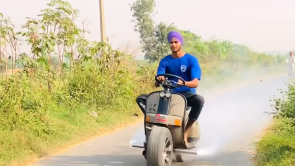 Scooter with steering wheel and fire exhaust